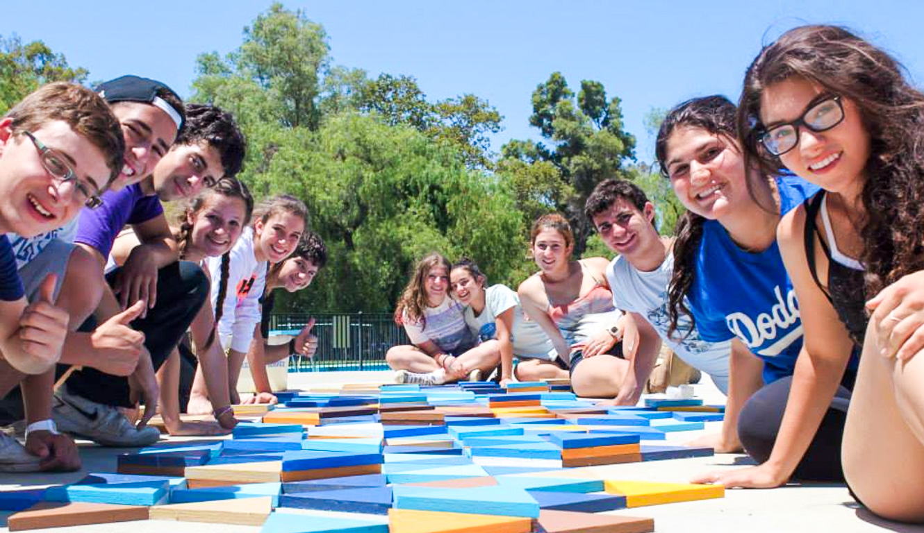 Campers working on a group art project