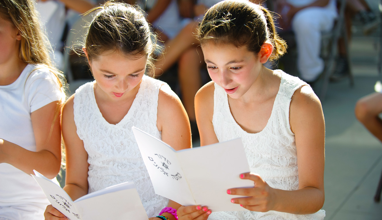 Campers reading a text