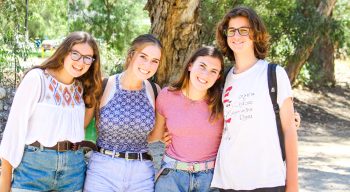 Group of teen campers taking a group photo